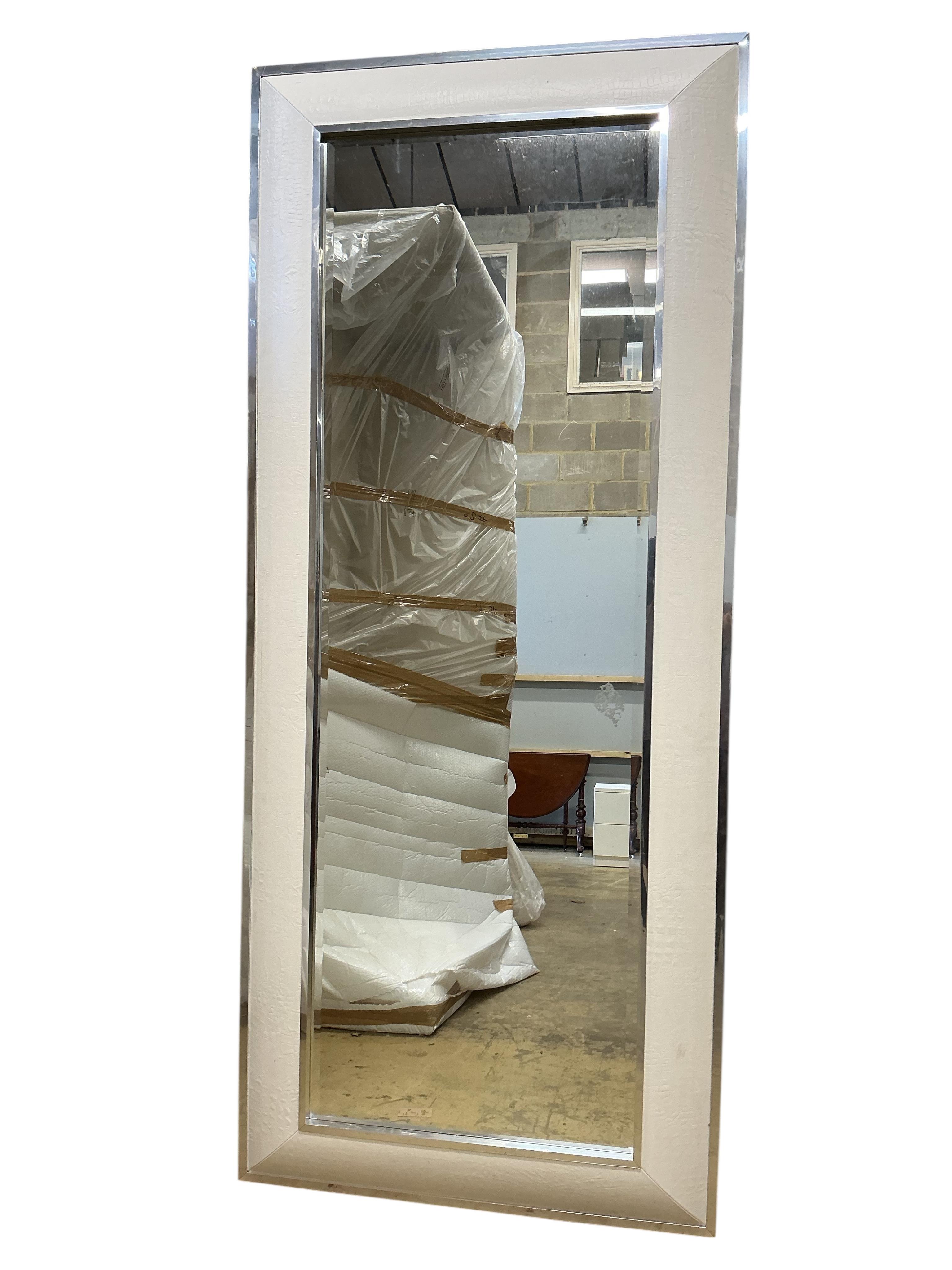 A pair of large rectangular chrome and faux crocodile wall mirrors, 228cm x 96cm